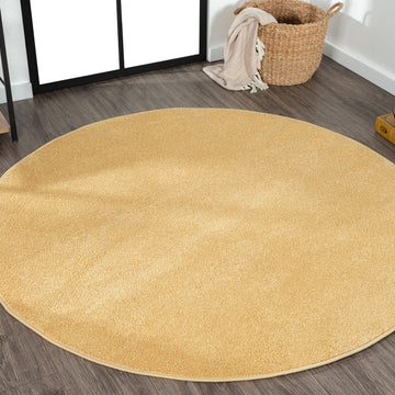 Haze Solid Low-pile Area Rug Mustard